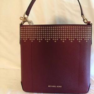 Micheal Kors cherry red leather purse Authentic.